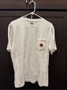 Men’s Uniqlo x KAWS x Sesame Street White Pocket Tee with Red Character Patch